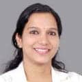 Headshot image of Dr. Sreeja, a dental pathologist working at the best dental care clinic in Chennai, 4 Squares Dentistry