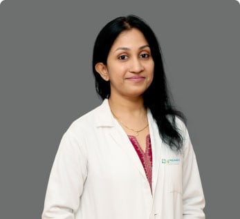 Dr Aesha Imran Syeda, Clinical Director and oral pathologist leading the team of specialists offering notable dental care in Medavakkam and Gowrivakkam